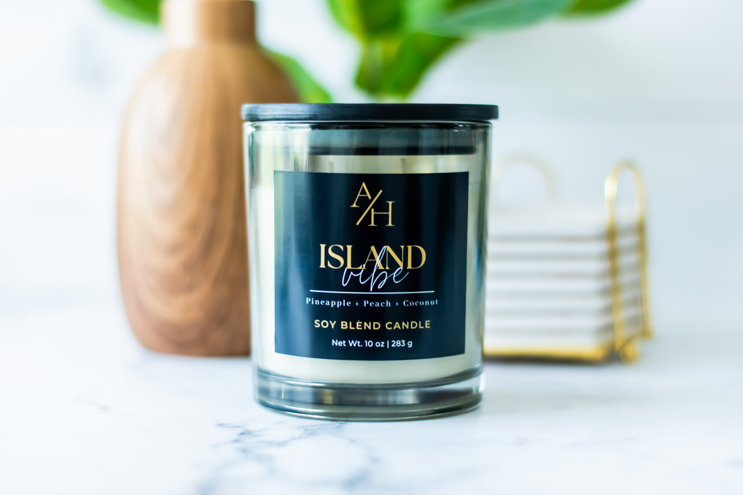 Island Vibe is a tropical paradise featuring notes of Orange, Pineapple, Peach, Mango, and Coconut Milk.
This candle fills your home with a bright, uplifting aroma that’s perfect for relaxing, entertaining, or adding a touch of summer to any room.